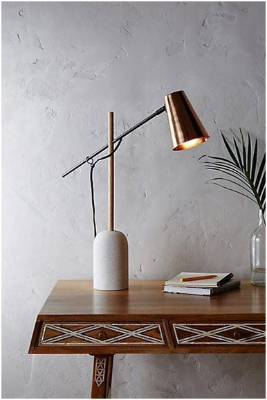 FabModula interior designer products wooden table with table lamp and books